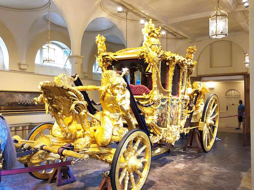 A horse carriage at the Royal Mews while taking a tour of Buckingham Palace, London, UK