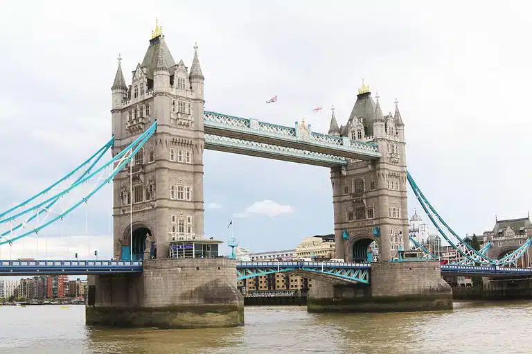 The Tower Bridge. It's neo classical design is to blend in with the Tower of London. It's one of the most recognized bridges.