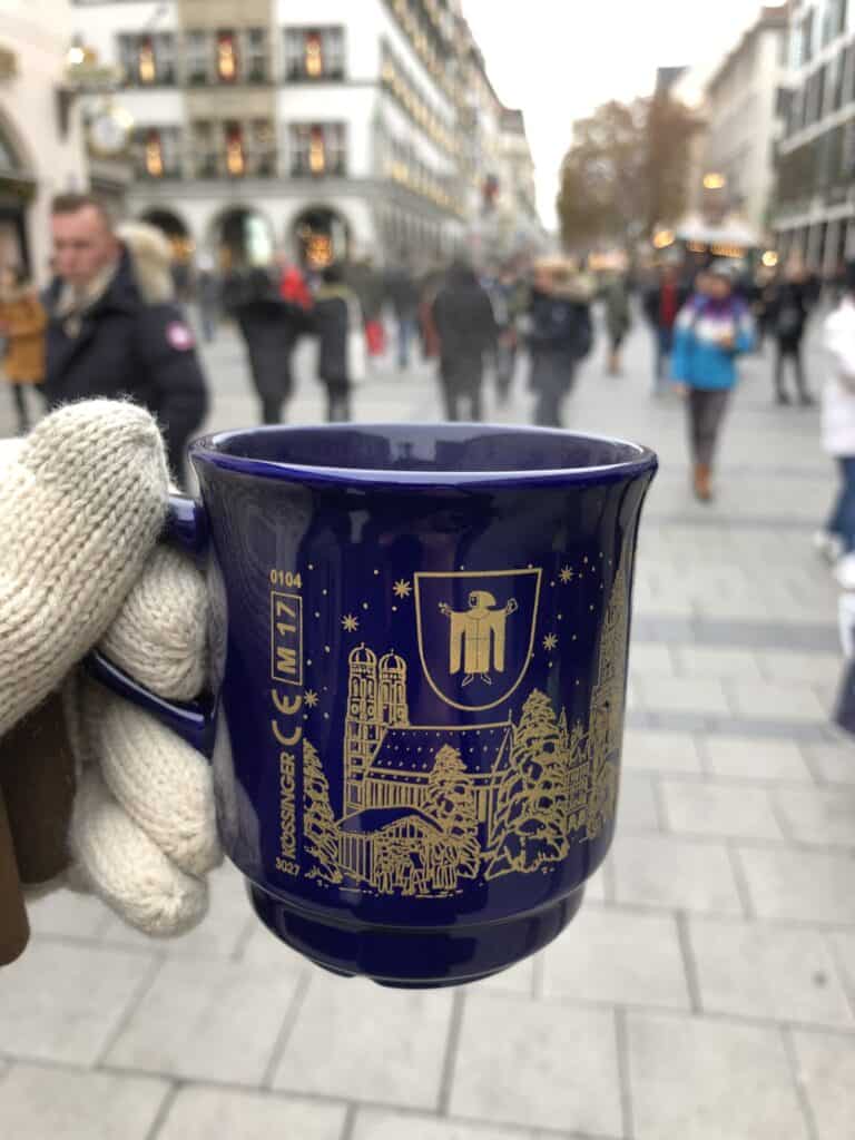 There are many styles of cups for Gluhwein that would make wonderful souvenirs for a cheap price. This one is blue with Munich outline in gold. 